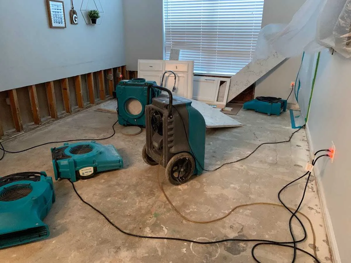 Dehumidifier in flood-cut room for Water Damage Restoration in Warwick
